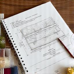 Schizzo di design per un cuscino personalizzato.